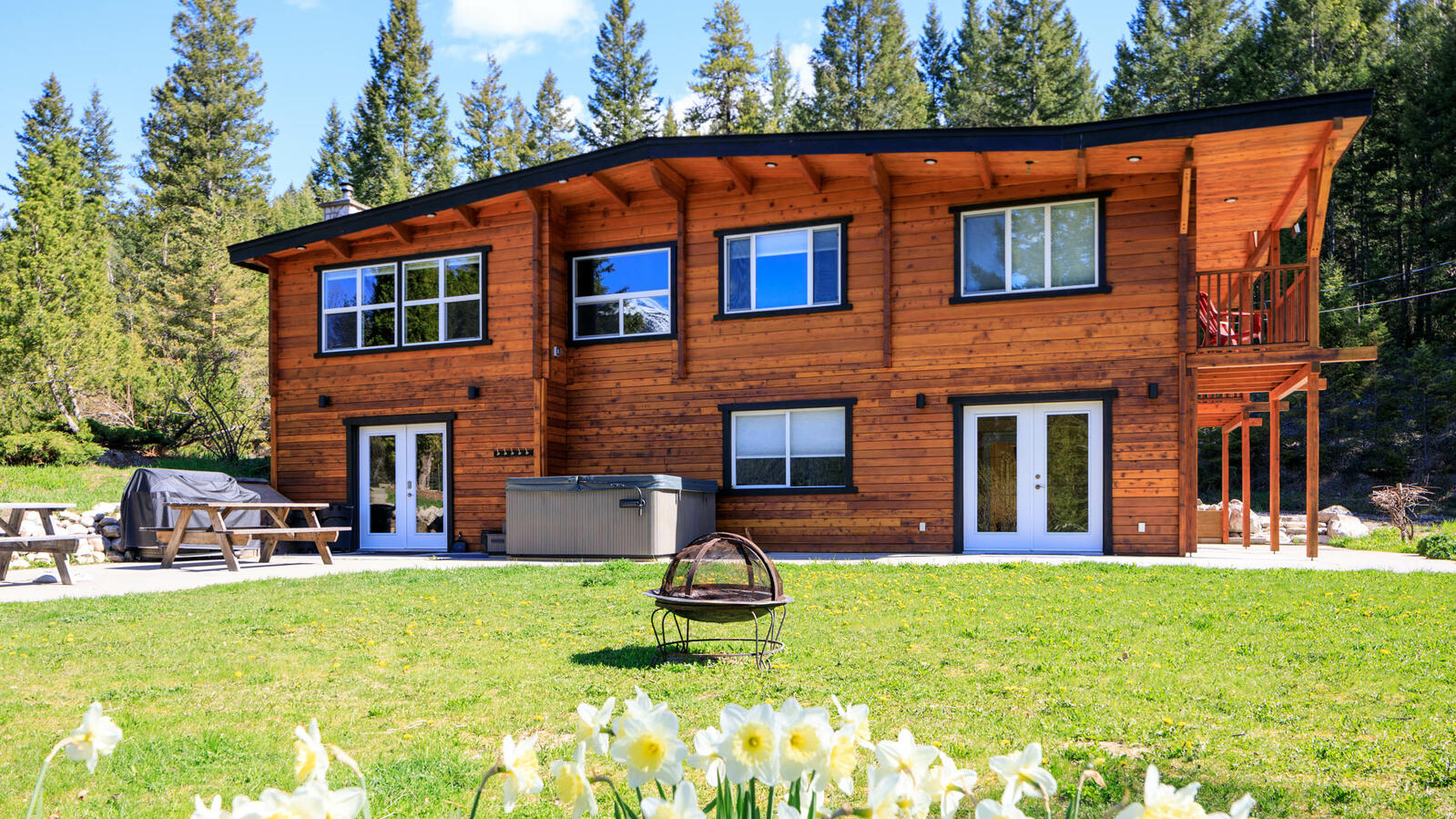 Back of Lodge with Hot Tub and BBQ